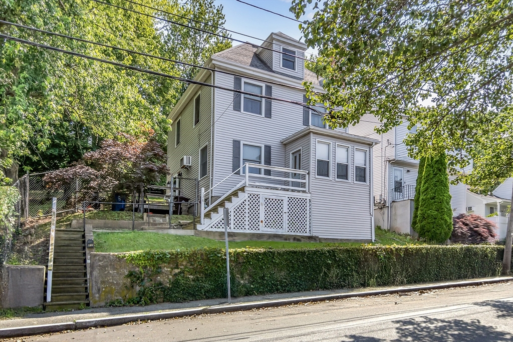 136 Vane Street Revere, MA 02151 - Photo 1 of 30 front view of a house with a yard