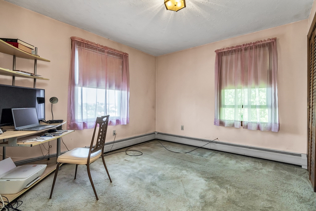 136 Vane Street Revere, MA 02151 - Photo 19 of 30 a workspace with furniture and window
