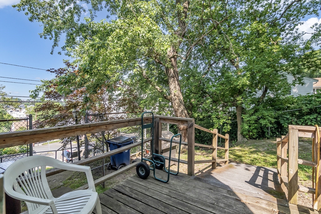 136 Vane Street Revere, MA 02151 - Photo 22 of 30 a view of balcony with furniture and trees