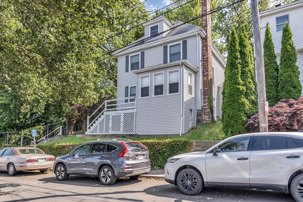 136 Vane Street Revere, MA 02151 - Photo 27 of 30 a car parked in front of a house