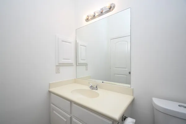 a bathroom with a sink and a toilet