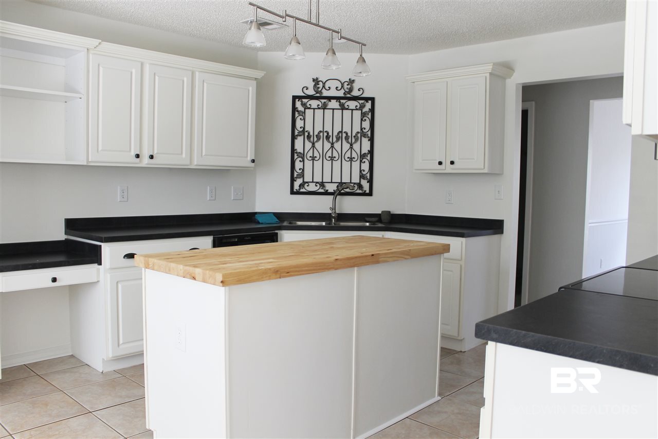 8522 Southern Oak Court Mobile, AL 36695 - Photo 5 of 21 An abundance of pretty white cabinets
