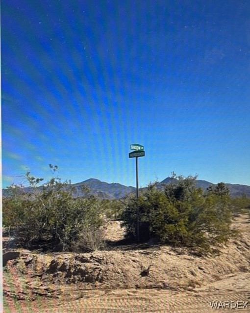 241-17-005 South Horseshoe Road Yucca, AZ 86438 - Photo 21 of 23 a view of a road with a mountain in the background