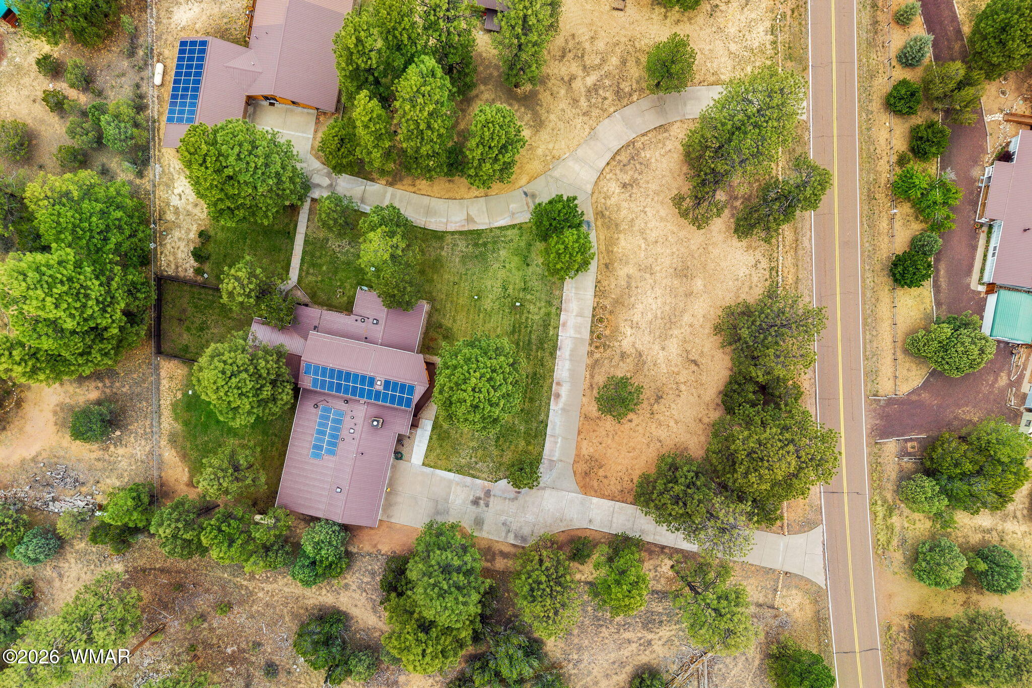 2922 Pine Rim Road Overgaard, AZ 85933 - Photo 48 of 58 an aerial view of a house with a yard basket ball court and outdoor seating