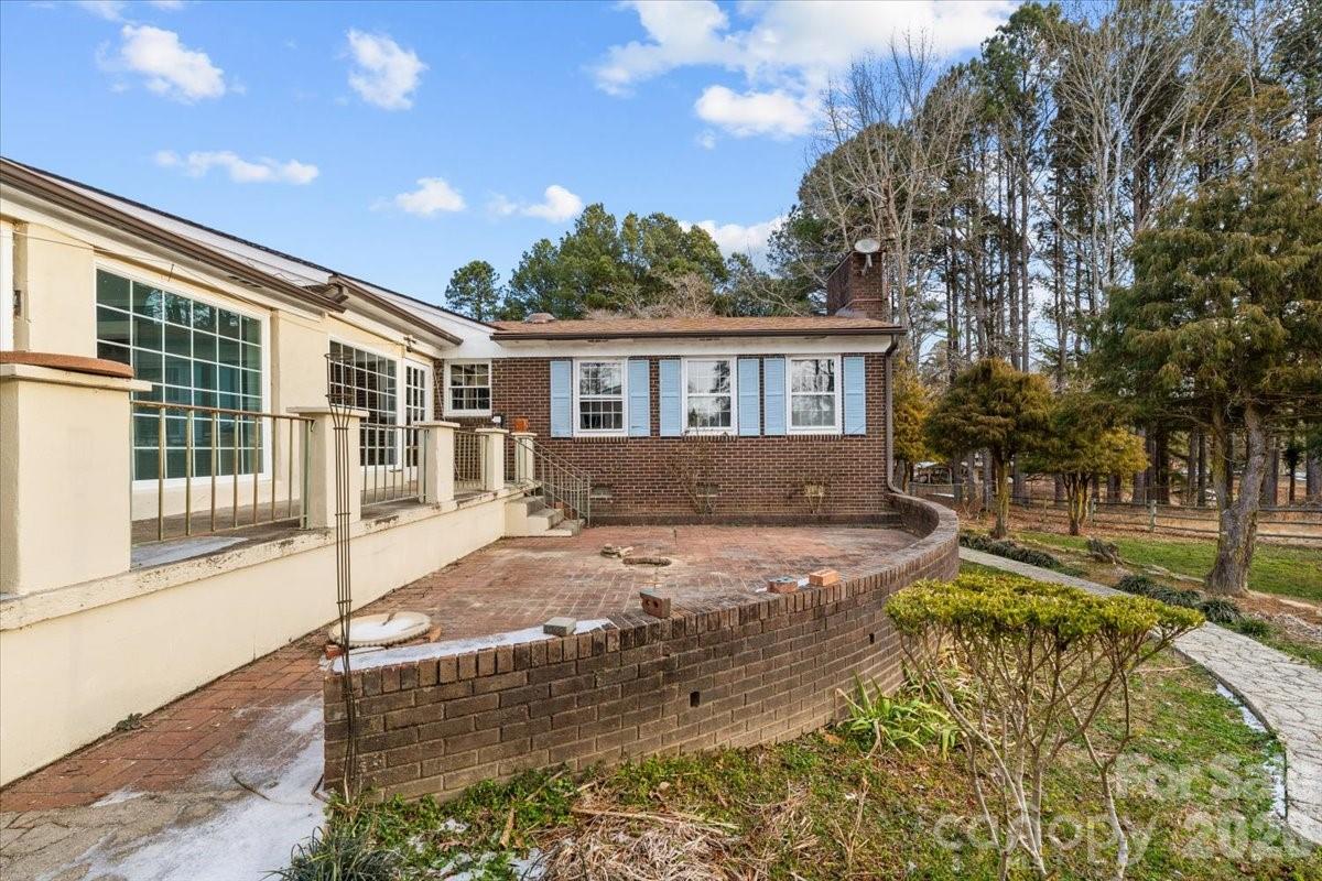 444 Craven Street Star, NC 27356 - Photo 12 of 48 a house view with a outdoor space