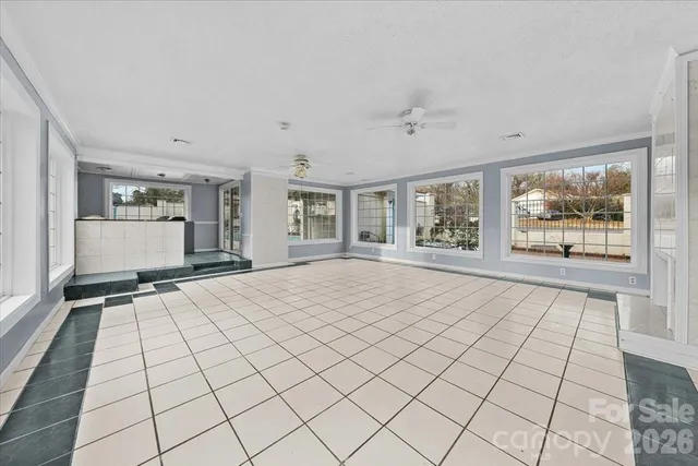 a view of an empty room and window