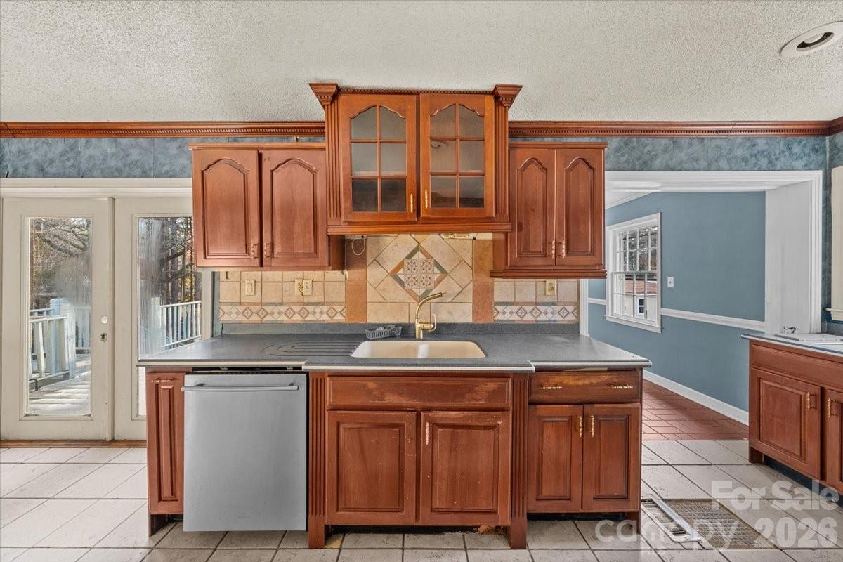 444 Craven Street Star, NC 27356 - Photo 27 of 48 a kitchen with stainless steel appliances granite countertop a sink and cabinets