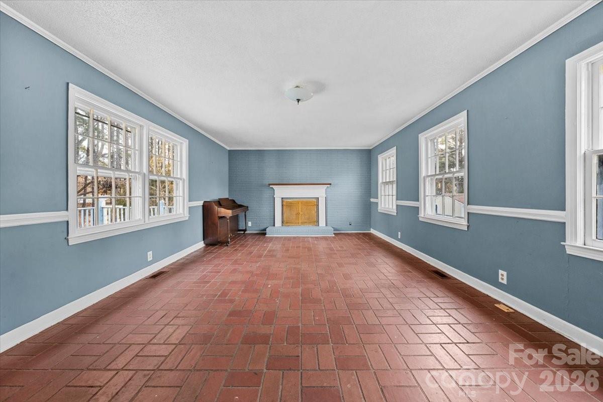 444 Craven Street Star, NC 27356 - Photo 28 of 48 a bedroom with a bed and a large window