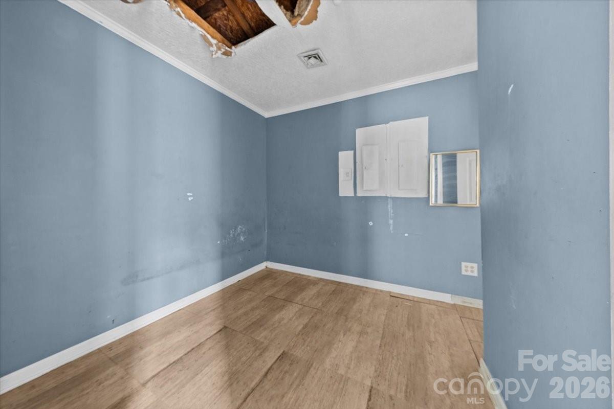 444 Craven Street Star, NC 27356 - Photo 33 of 48 a view of empty room with wooden floor