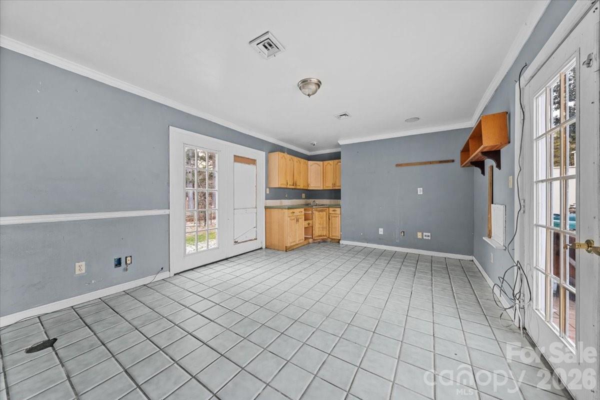 444 Craven Street Star, NC 27356 - Photo 37 of 48 a view of a livingroom with an empty space and a window