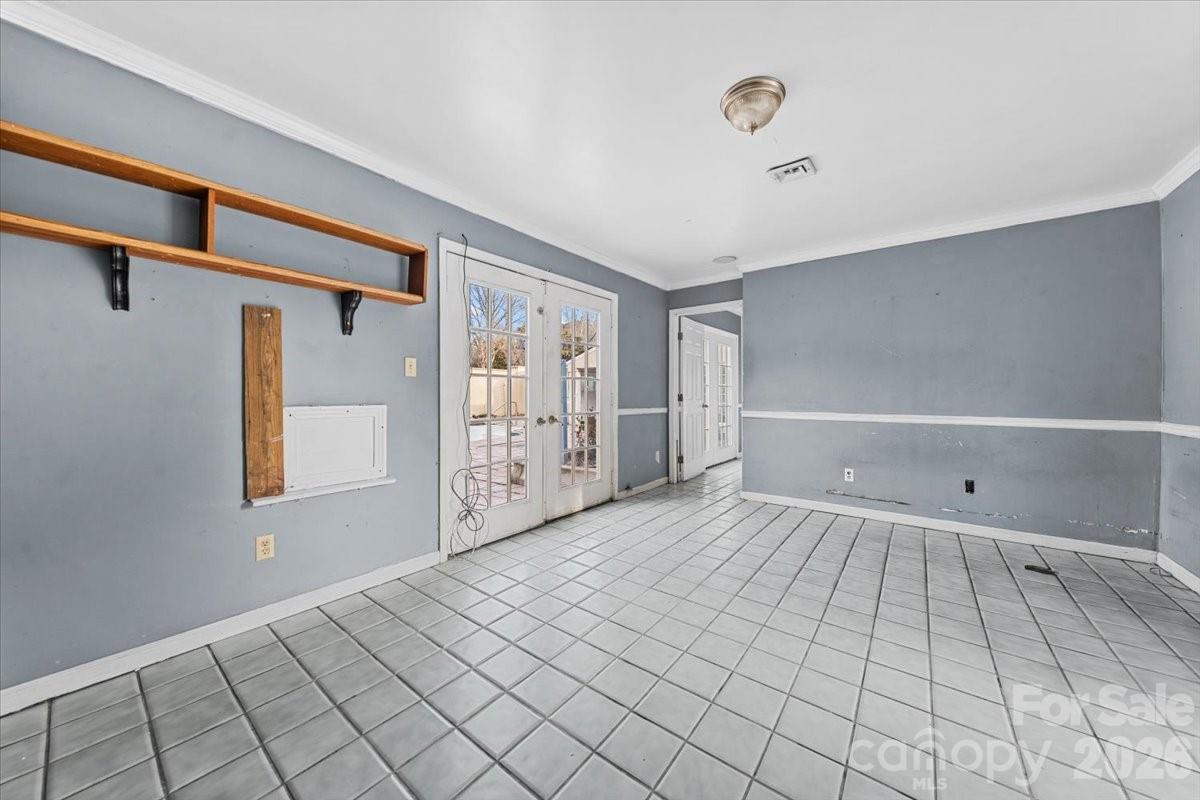 444 Craven Street Star, NC 27356 - Photo 38 of 48 a view of an empty room with window and stairs