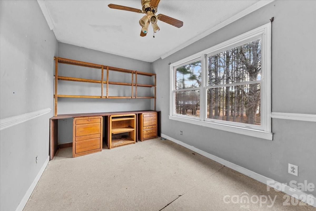 444 Craven Street Star, NC 27356 - Photo 43 of 48 a big room with windows and closet