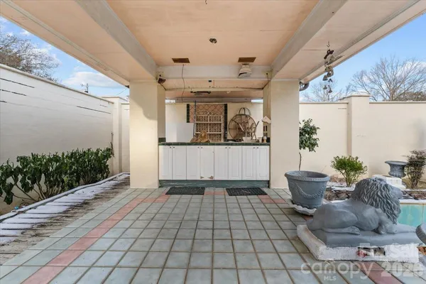 a view of a porch and garden