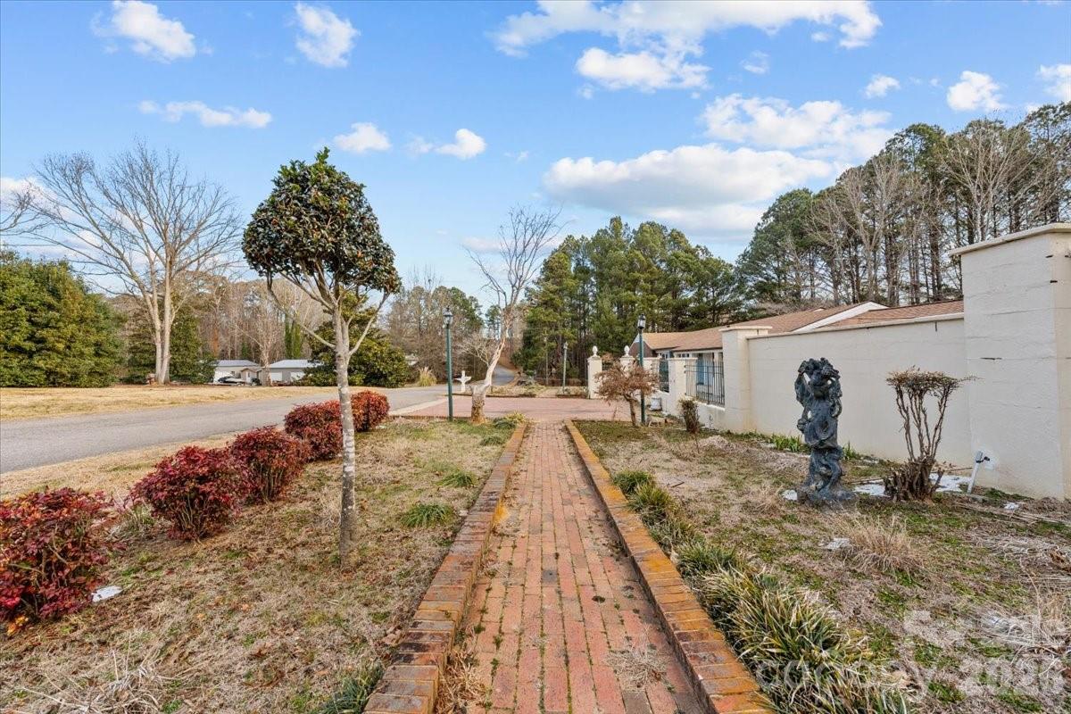 444 Craven Street Star, NC 27356 - Photo 10 of 48 a view of a yard with snow on the road