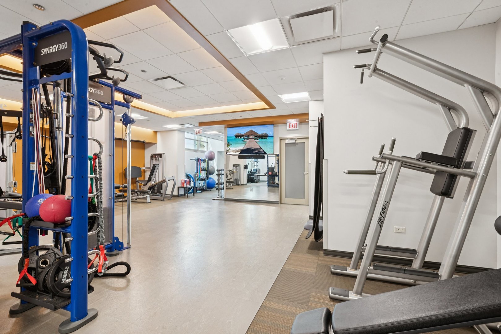 21 East Huron Street, Unit 1806 Chicago, IL 60611 - Photo 42 of 43 a view of a room with gym equipment