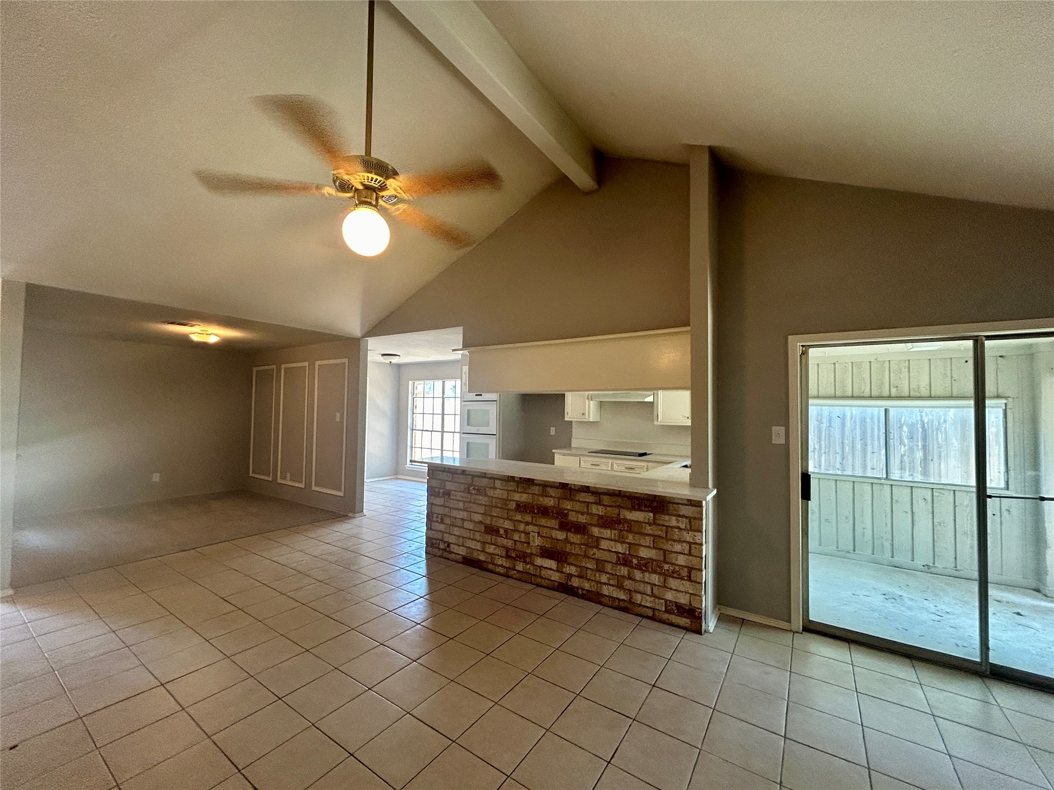 2510 Knollbrook Lane Spring, TX 77373 - Photo 9 of 24 a view of a livingroom with a ceiling fan and window