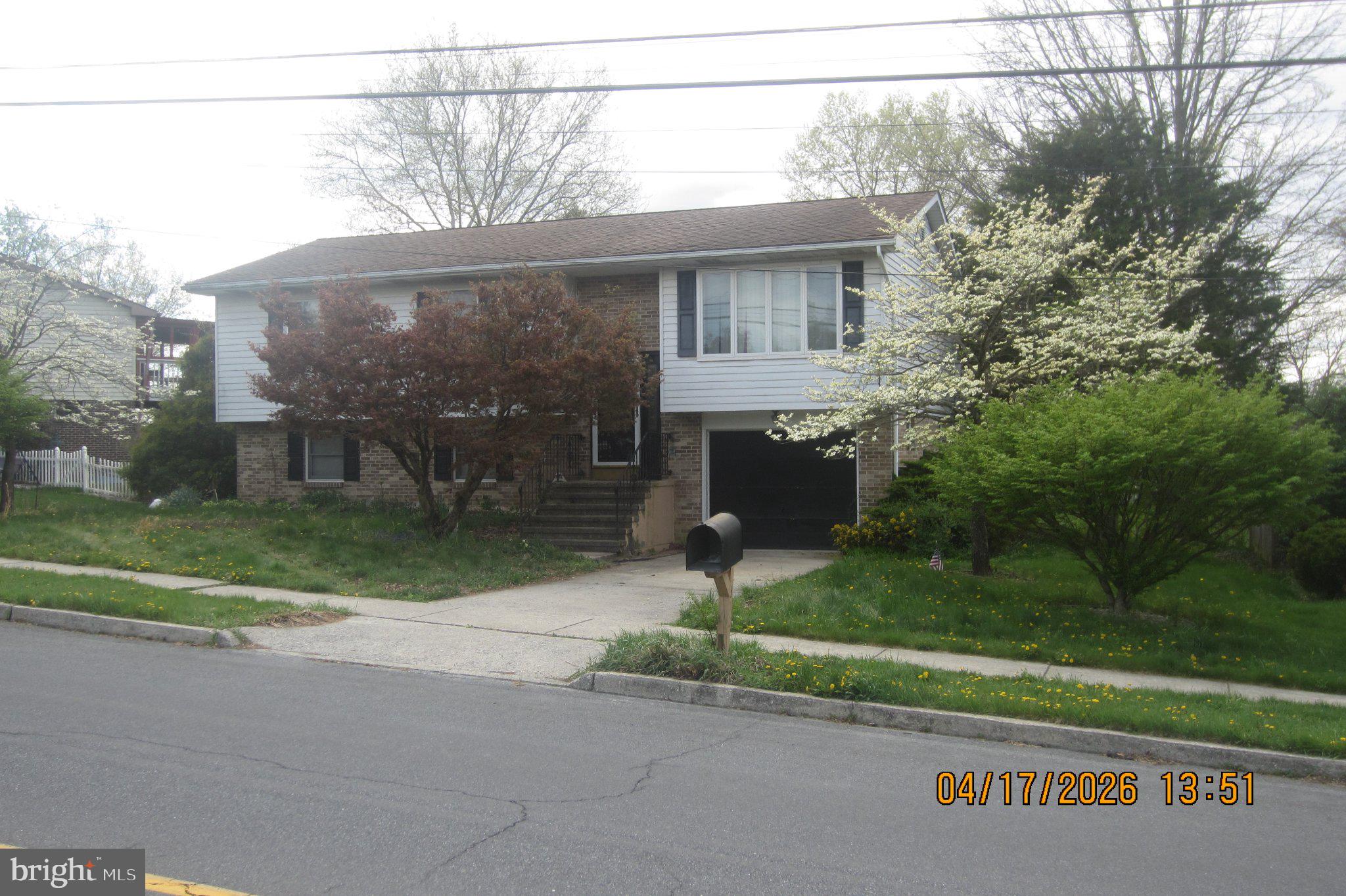 312 Sarhelm Road Harrisburg, PA 17112 - Photo 2 of 62 Charming split-level home with greenery.