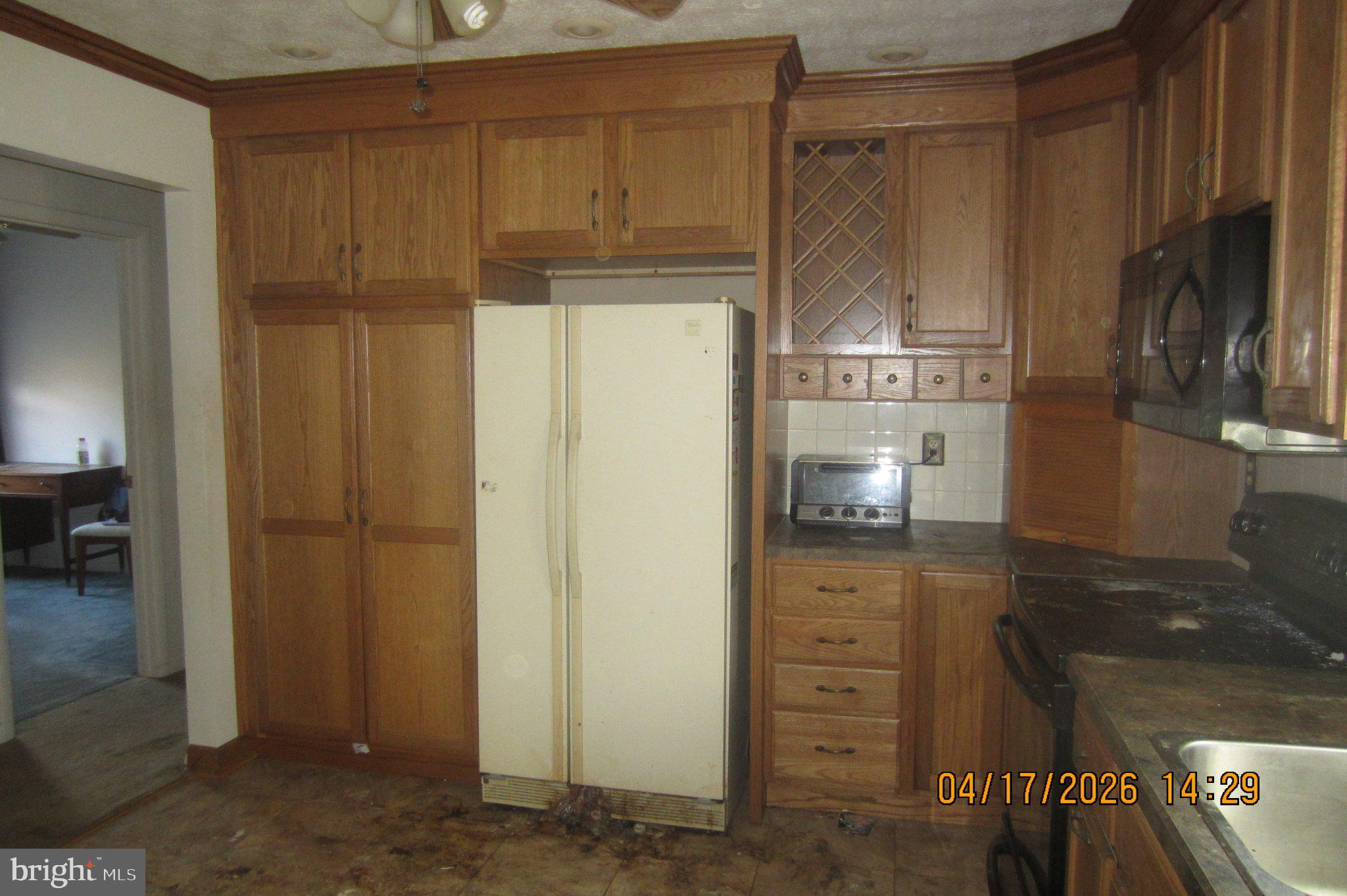 312 Sarhelm Road Harrisburg, PA 17112 - Photo 25 of 62 Spacious kitchen with wooden cabinetry.