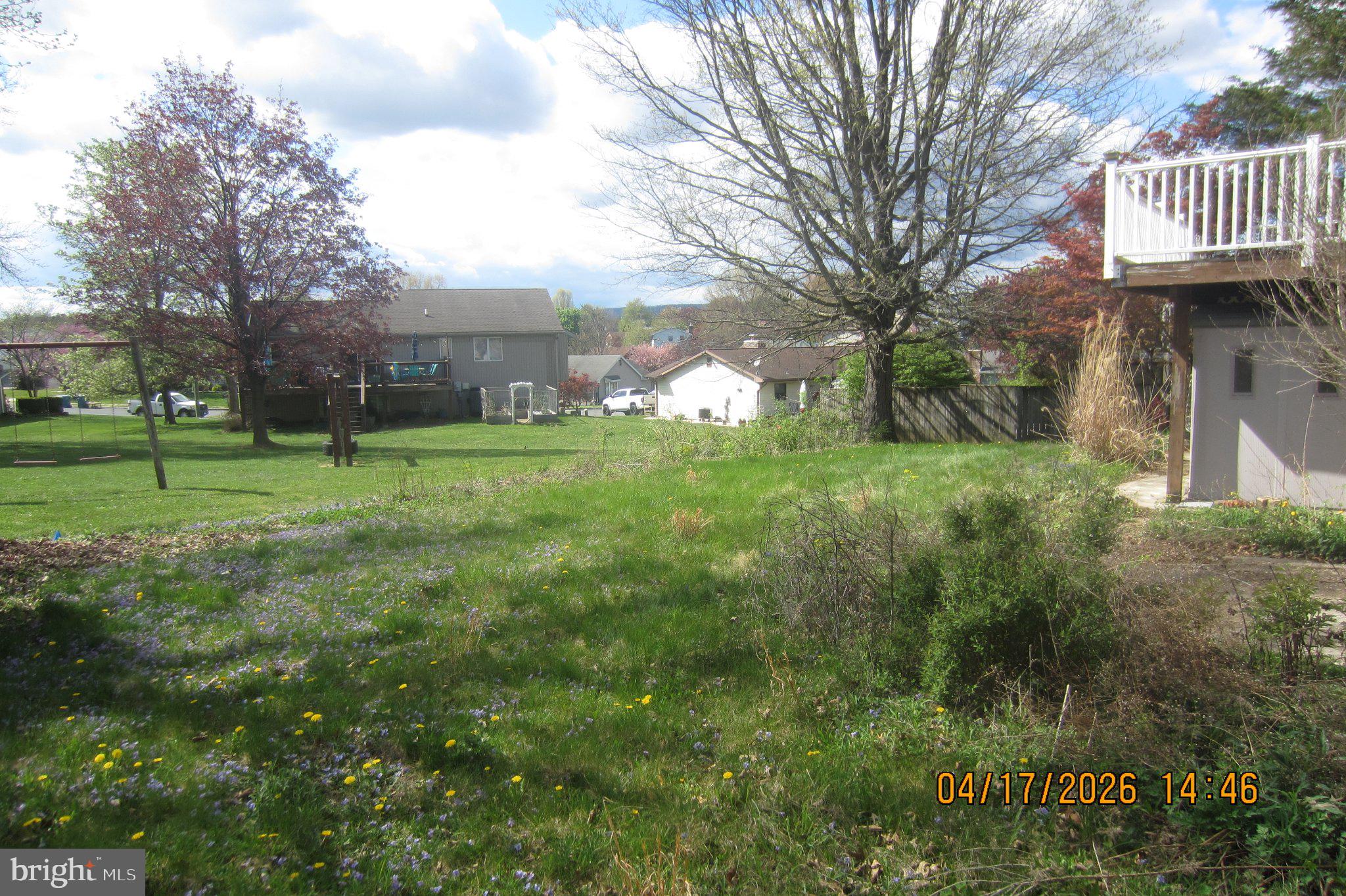 312 Sarhelm Road Harrisburg, PA 17112 - Photo 58 of 62 Lush green yard under a bright sky.
