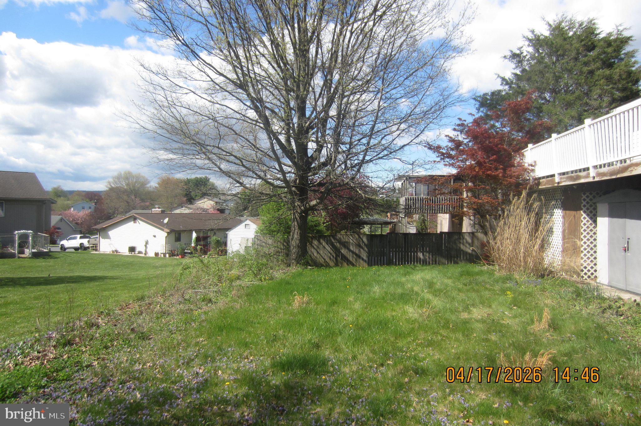 312 Sarhelm Road Harrisburg, PA 17112 - Photo 59 of 62 Spacious backyard with vibrant greenery.