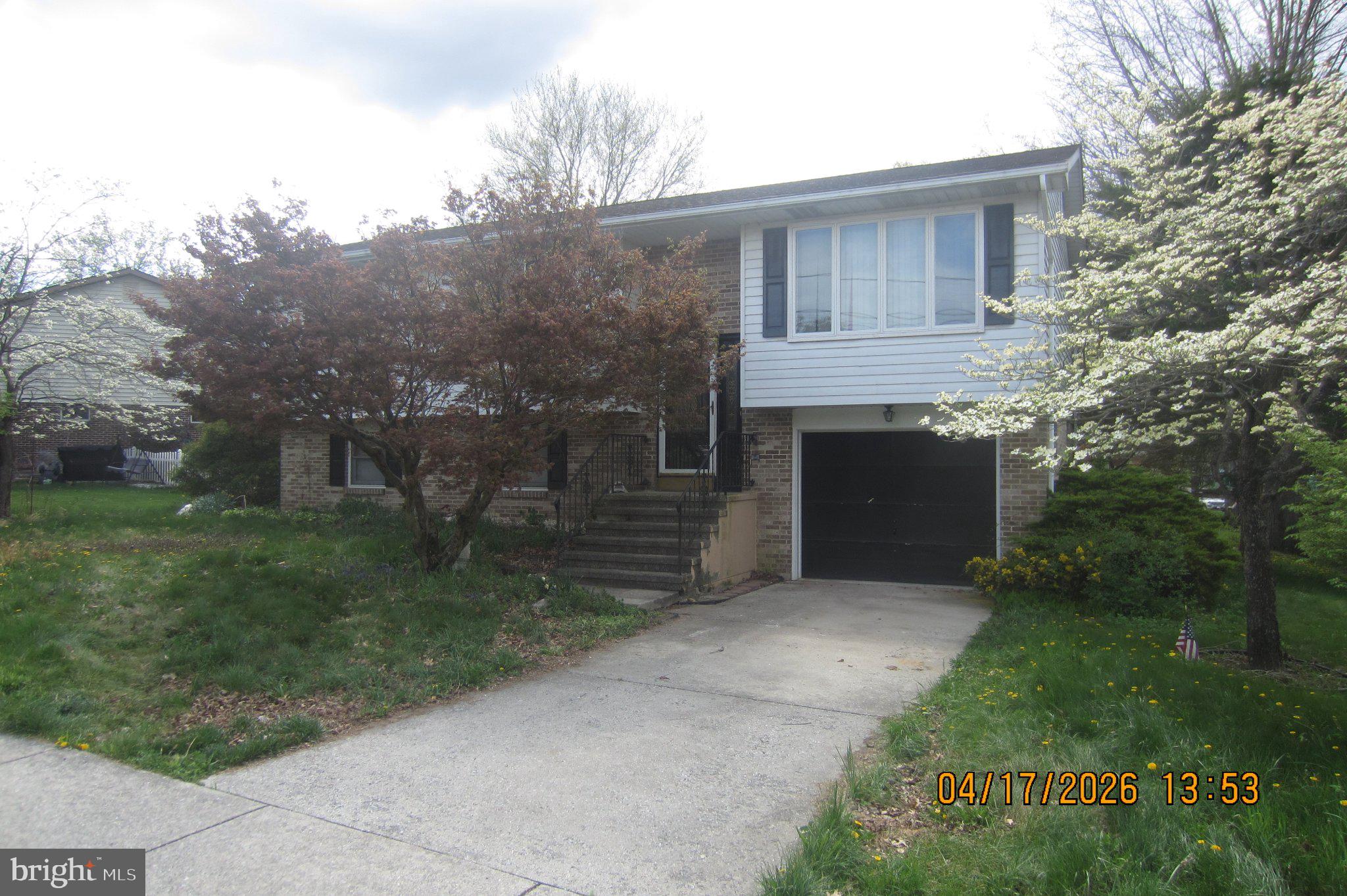 312 Sarhelm Road Harrisburg, PA 17112 - Photo 6 of 62 Charming split-level home with greenery.