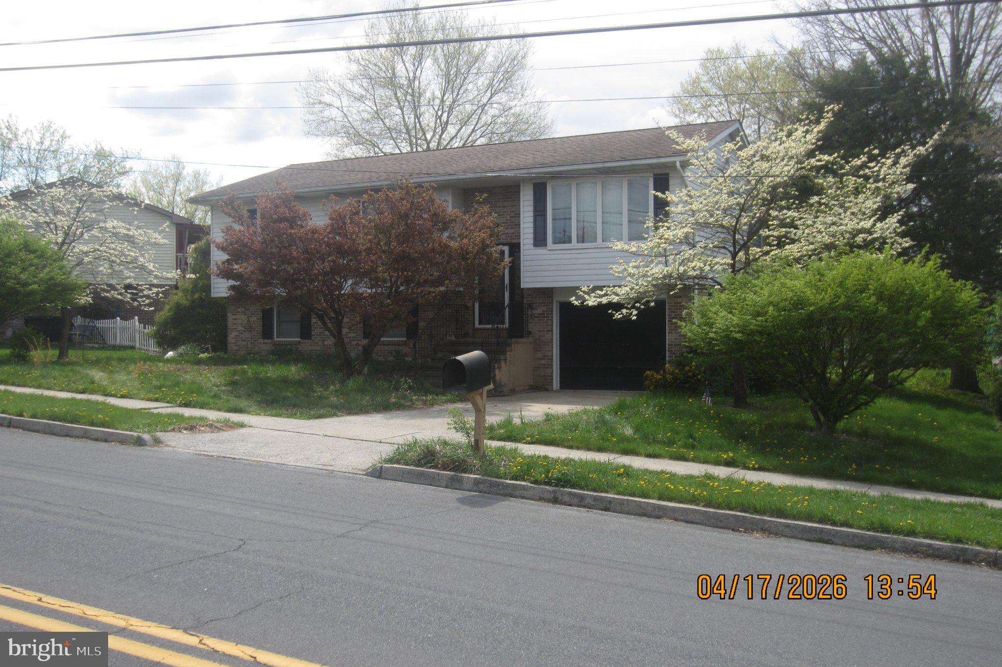312 Sarhelm Road Harrisburg, PA 17112 - Photo 8 of 62 Charming split-level home with greenery.