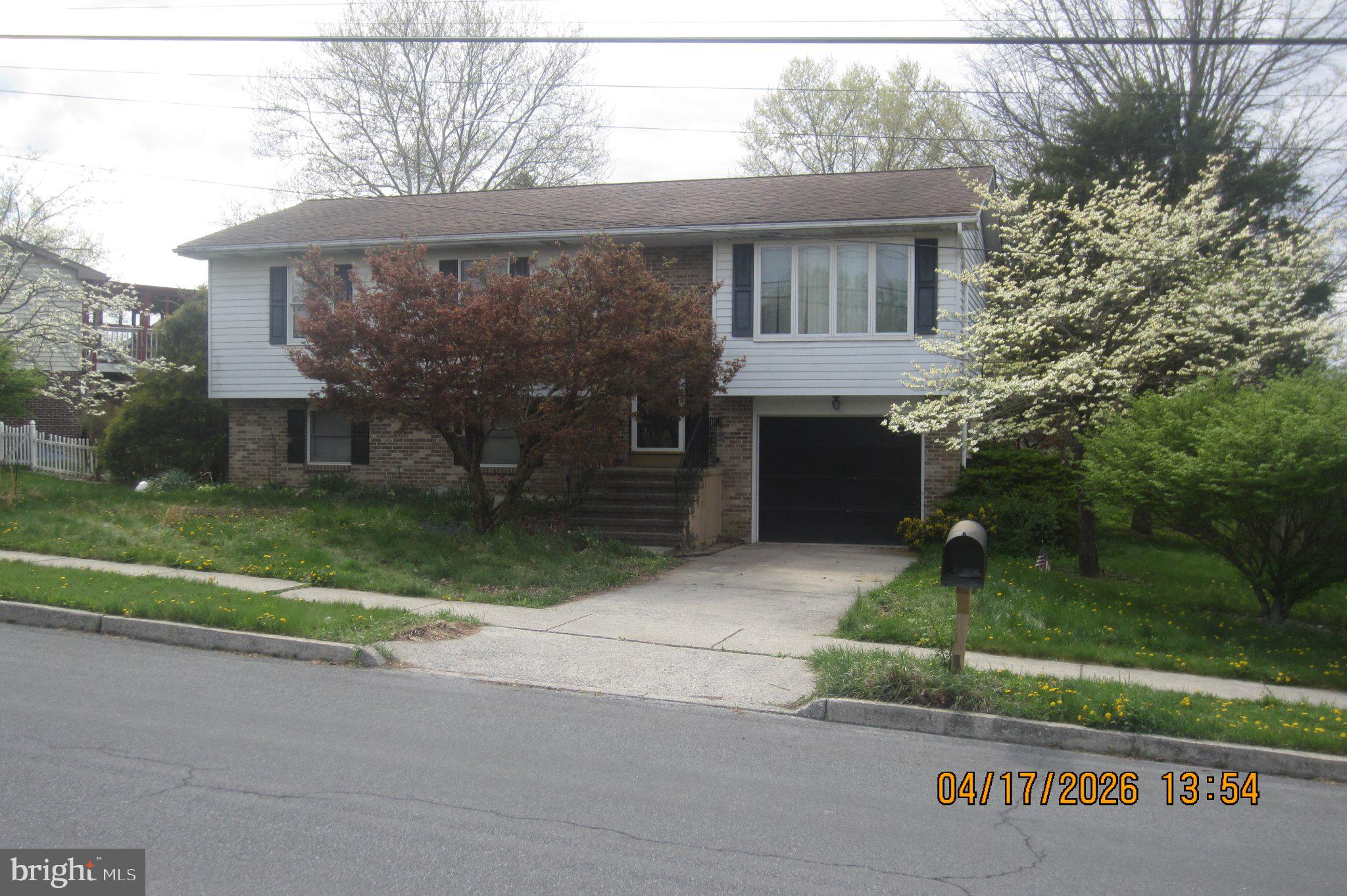 312 Sarhelm Road Harrisburg, PA 17112 - Photo 9 of 62 Charming split-level home with greenery.