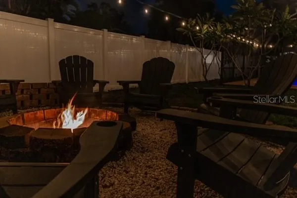 a view of a vase of flowers sitting on a table