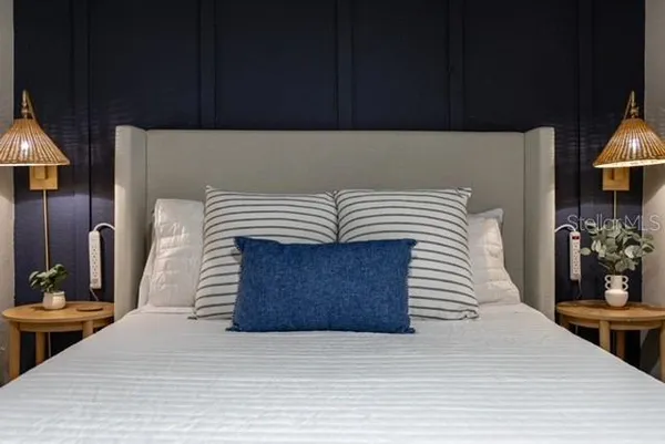 a kitchen with stove and cabinets