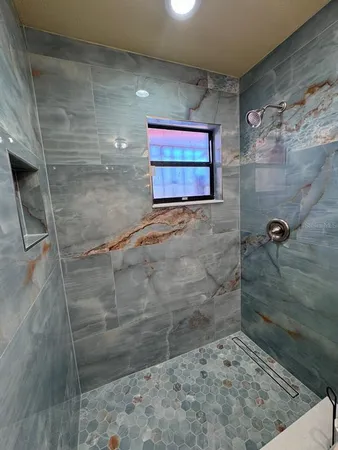 a view of a fireplace in a hallway