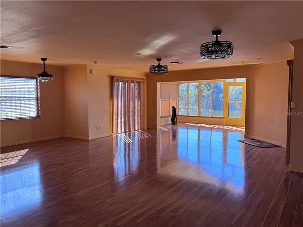 a blue and white photo of a living room