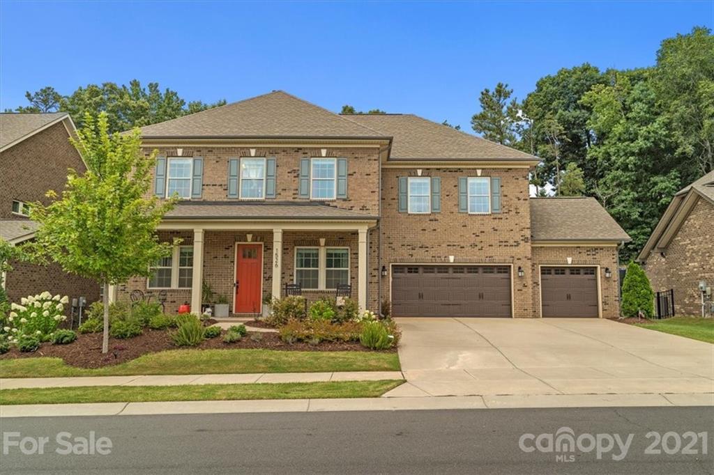 1526 Afton Way Fort Mill, SC 29708 - Photo 1 of 48 a front view of a house with a yard
