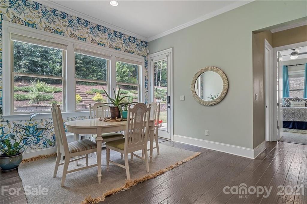 1526 Afton Way Fort Mill, SC 29708 - Photo 17 of 48 a view of a dining room with furniture window and wooden floor