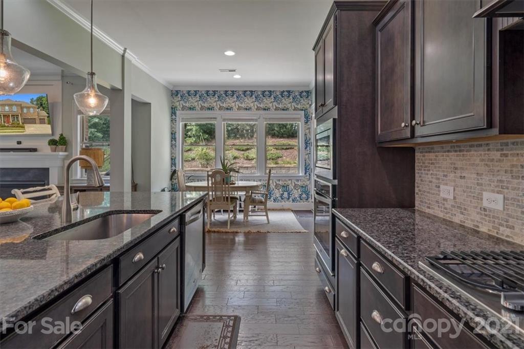 1526 Afton Way Fort Mill, SC 29708 - Photo 21 of 48 a kitchen with counter top space a sink and appliances