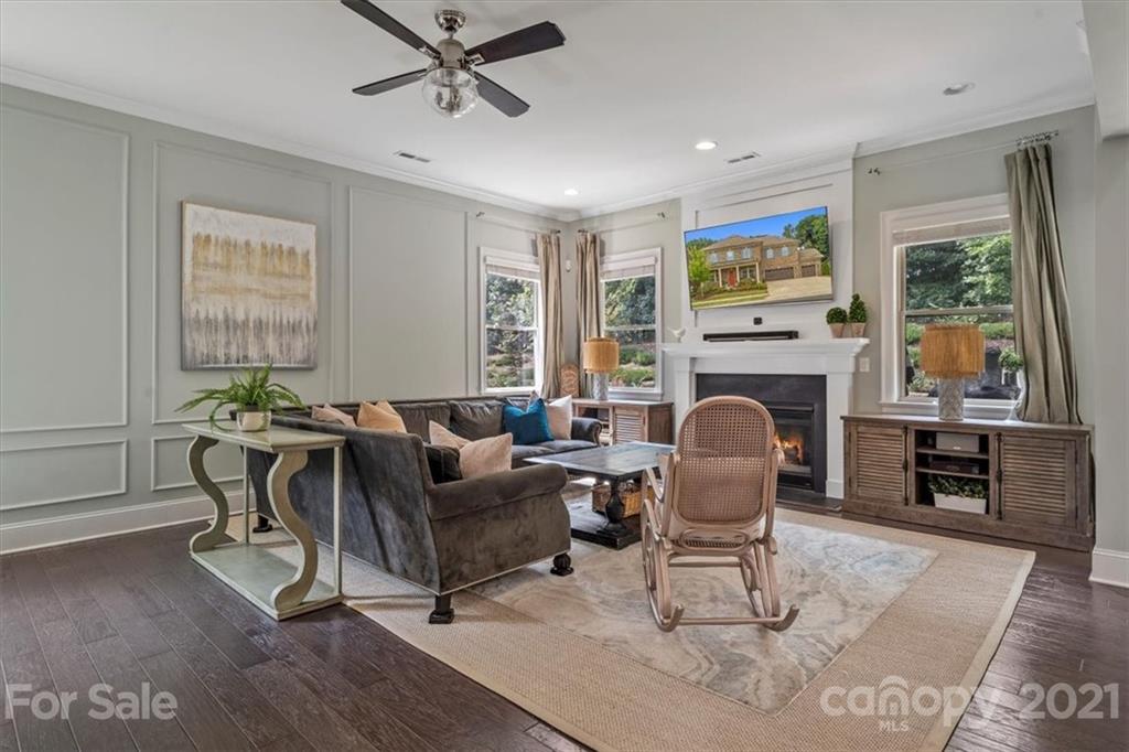 1526 Afton Way Fort Mill, SC 29708 - Photo 24 of 48 a living room with furniture a window and a fireplace