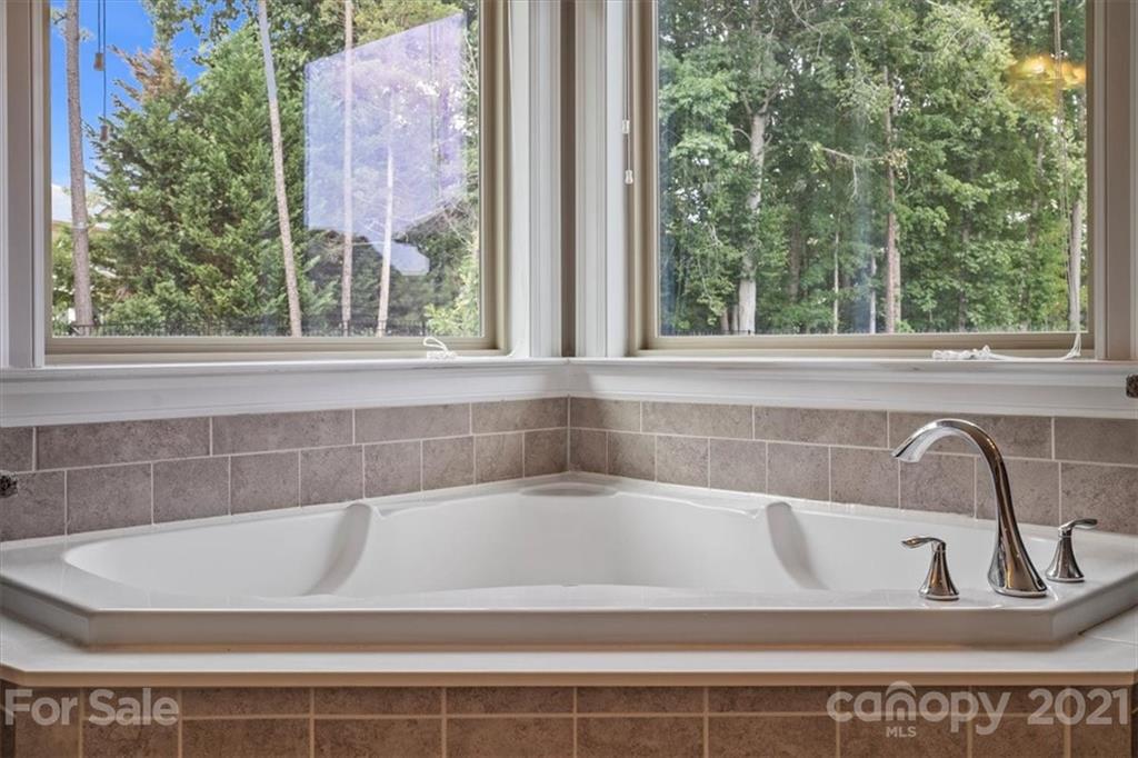 1526 Afton Way Fort Mill, SC 29708 - Photo 33 of 48 a bath tub sitting in a bathroom next to a window