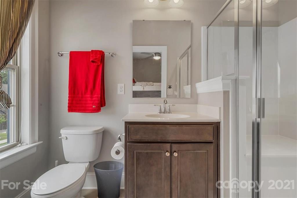 1526 Afton Way Fort Mill, SC 29708 - Photo 38 of 48 a bathroom with a sink toilet vanity and shower