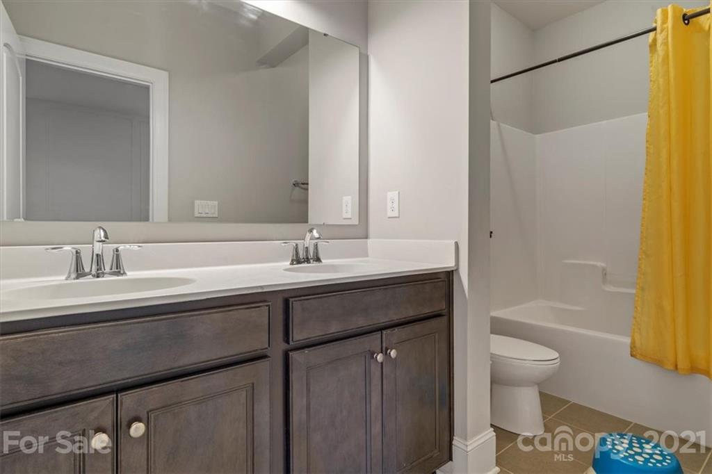 1526 Afton Way Fort Mill, SC 29708 - Photo 40 of 48 a bathroom with a sink a toilet and a bathtub
