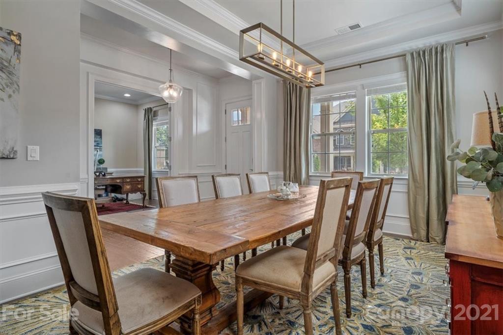 1526 Afton Way Fort Mill, SC 29708 - Photo 9 of 48 a view of a dining room with furniture window and wooden floor