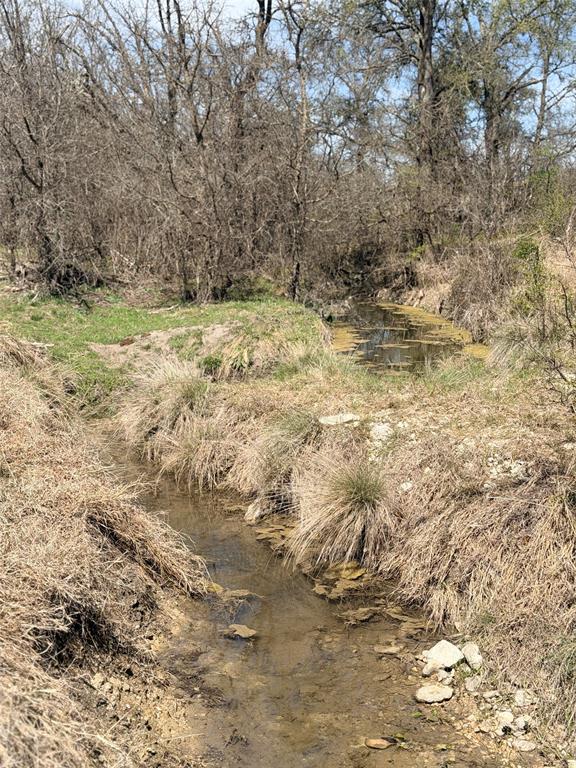 7642 Cr 512 Road Hamilton, TX 76531 - Photo 6 of 11 a view of outdoor space with wooden floor