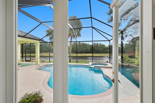 a view of a house with a swimming pool