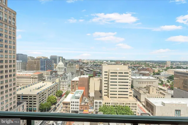 a view of a city with tall buildings