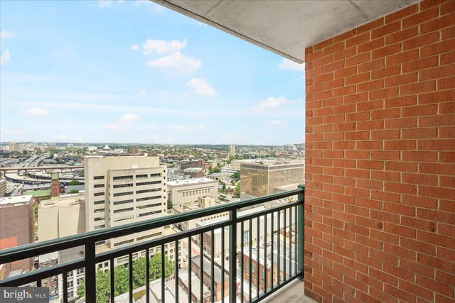 a view of a balcony with city view