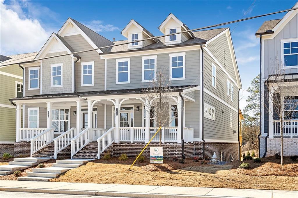 152 Palm Street Holly Springs, GA 30115 - Photo 3 of 33 a view of a large white building