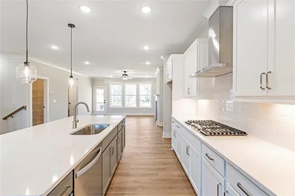 a kitchen with counter top space and stove
