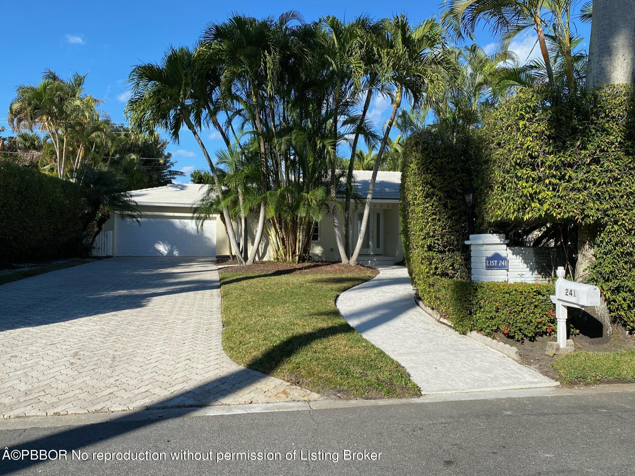 241 List Road Palm Beach, FL 33480 - Photo 3 of 3 a view of a yard with plants