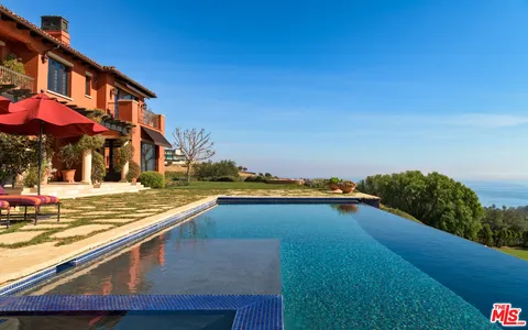 a view of outdoor space and swimming pool