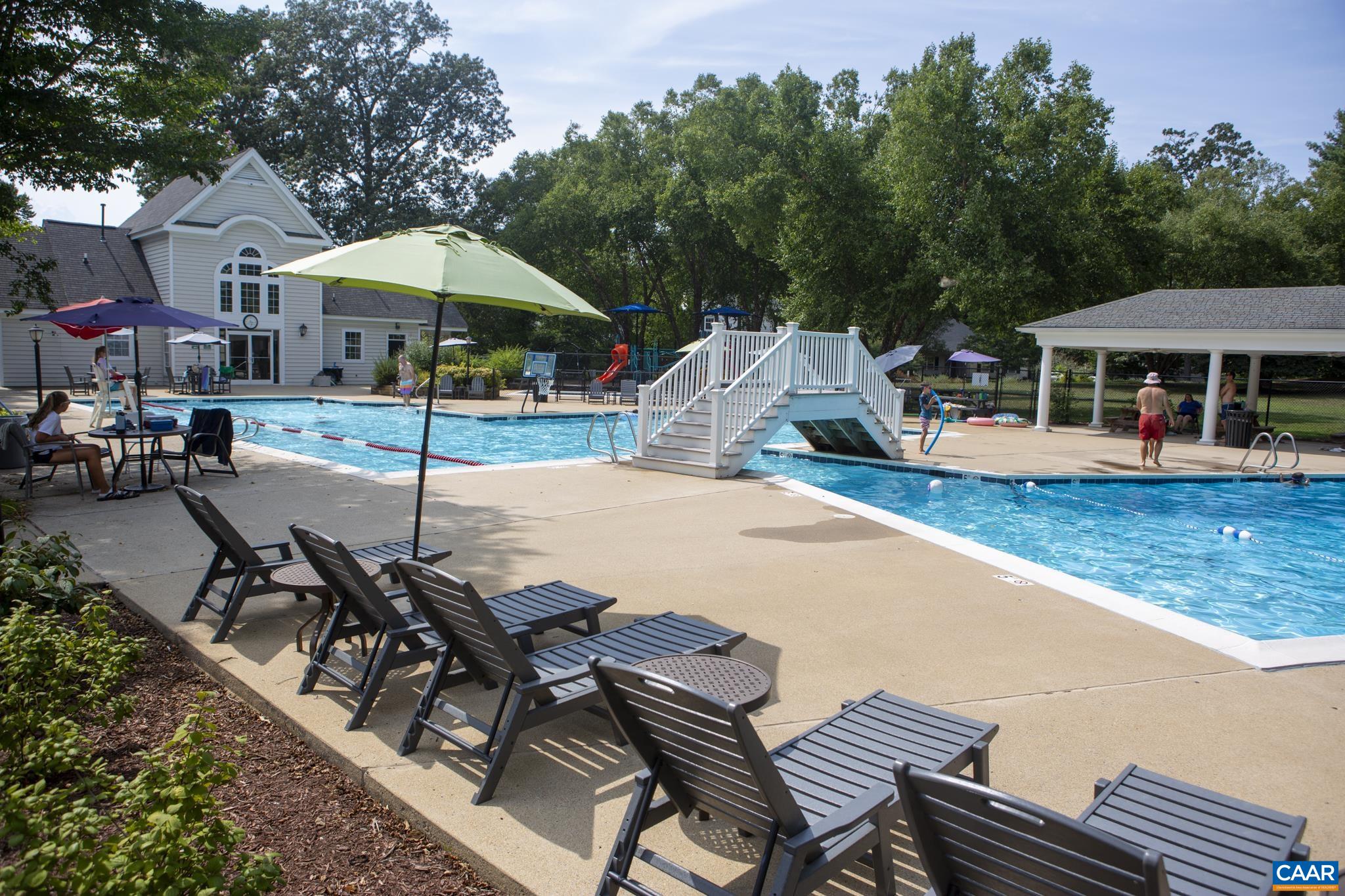 1330 Mosby Rch Charlottesville, VA 22901 - Photo 25 of 25 an outdoor space with patio and white umbrellas