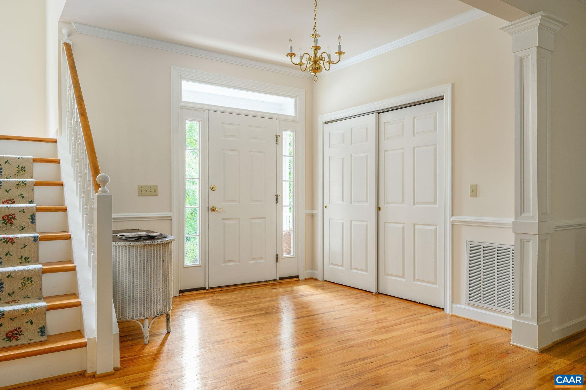 1330 Mosby Rch Charlottesville, VA 22901 - Photo 3 of 25 a view of an empty room with window and wooden floor