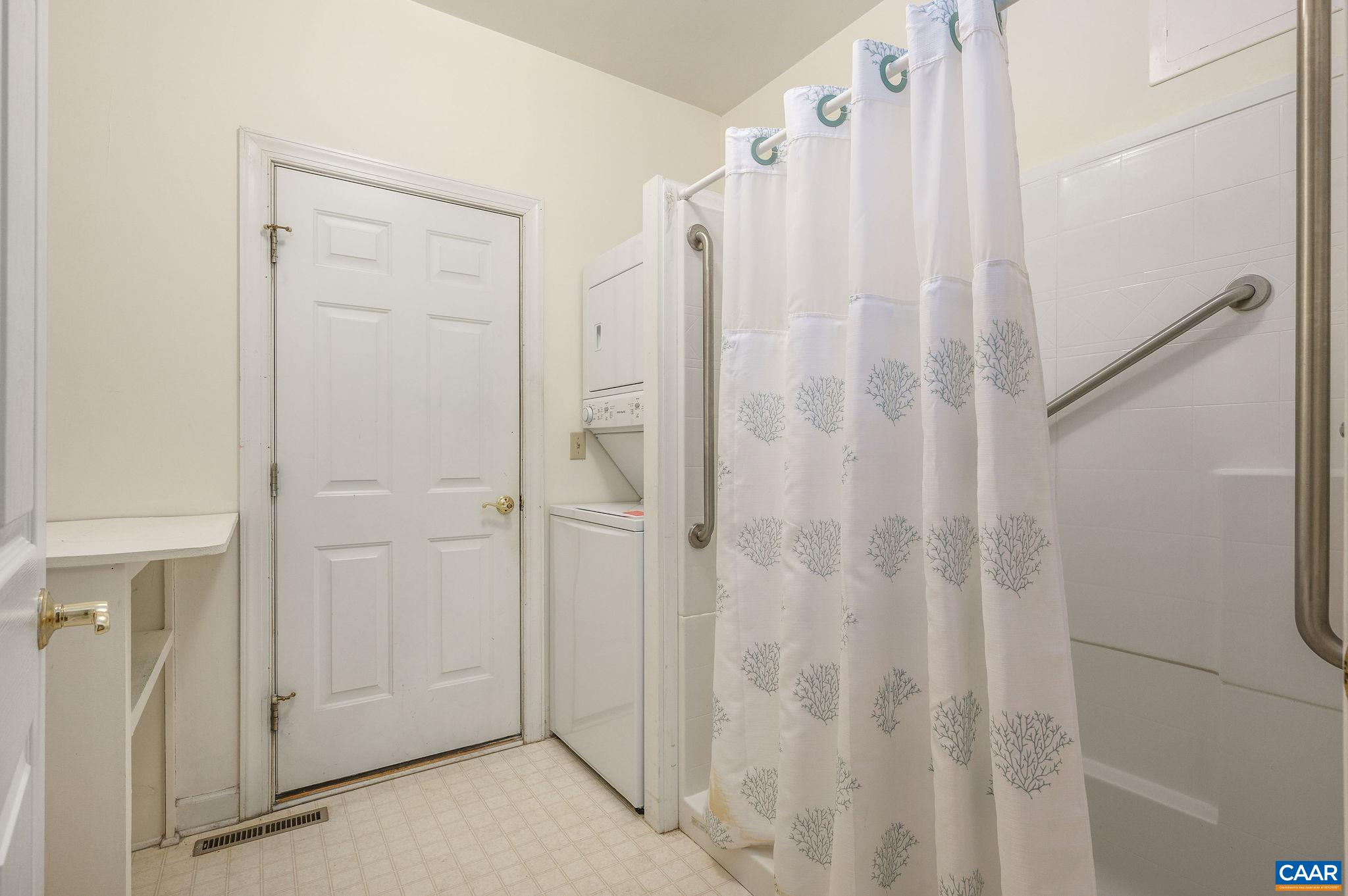 1330 Mosby Rch Charlottesville, VA 22901 - Photo 10 of 25 a view of a bathroom with a shower curtain